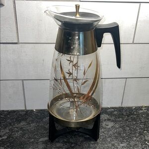 Vintage Pyrex Coffee Carafe. Has tea light candle warmer stand included.